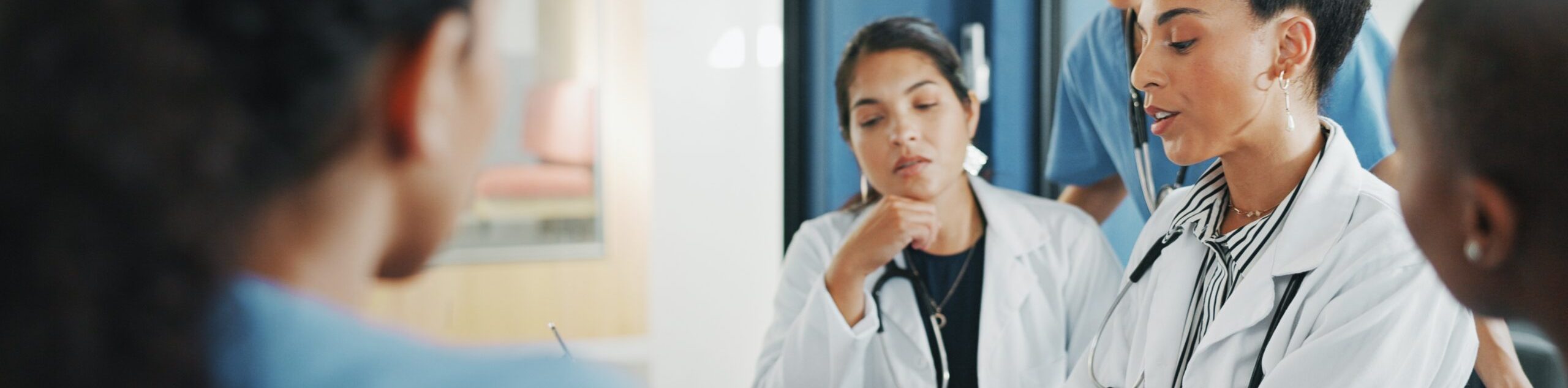 Doctors,,Nurse,And,Women,On,Clipboard,In,Meeting,,Collaboration,Or